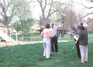 A trained facilitator conducts the place game at Omaha's Gifford Park