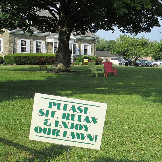 Simple, lightweight signs give people "permission" to use a space they once thought off-limits / Photo: Mary Lou Carolan