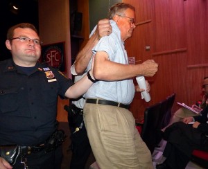 Fred Kent is evicted from the proceedings | Photo courtesy of Brooklyn Eagle